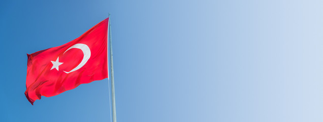 Banner with Turkey national red flag with crescent, half moon and star, with copy space for text, details, closeup