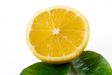 Ripe yellow  lemon on white background