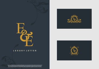 EE logo initial vector mark. Gold color elegant classical symmetric curves decor.