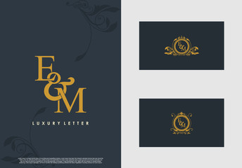 EM logo initial vector mark. Gold color elegant classical symmetric curves decor.