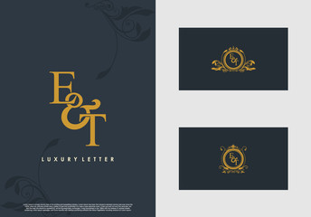 ET logo initial vector mark. Gold color elegant classical symmetric curves decor.