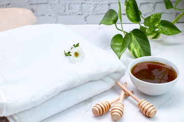 Honey pot for body care in a spa.