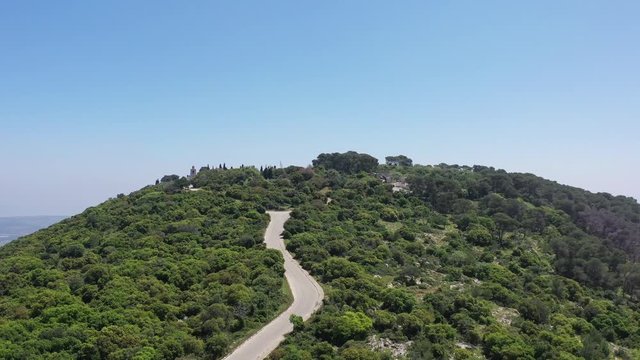 Church of the Transfiguration on top of Mt. Tavor, Israel. slow aerial climb. 