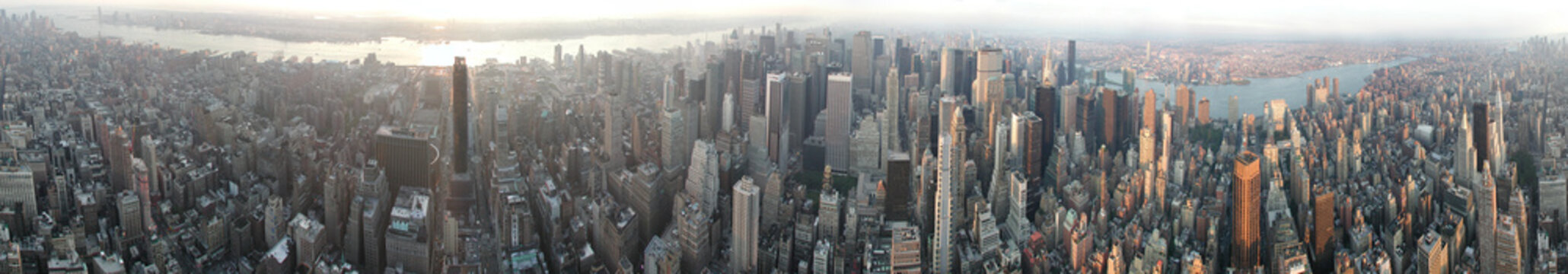 New York panorama view from Empire State Building with Hudson and East River © peterswelt.reisen