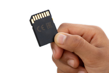 SD Card holds in hand isolated on white