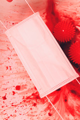 Splashes of blood dripping into the sink in the bathroom. red virus molecules medical mask