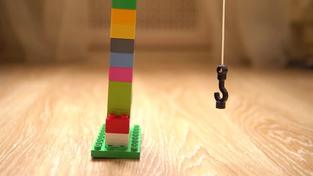 Children's toy tap on floor played by baby, slow