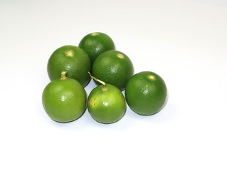Fresh green lemons from the garden Isolated on a white background.