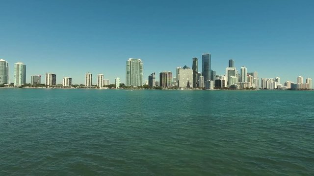 Great aerial footage of sky scrapers and a beautiful water view in the image also.