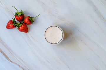 Kefir. Healthy Organic Drinkable Yogurt with Strawberries Fruit in Glass / Buttermilk Ayran.