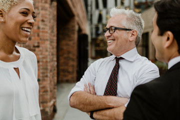 Diverse office workers outdoors