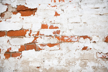 A fragment of the brickwork of an 18th century Church with traces of plaster