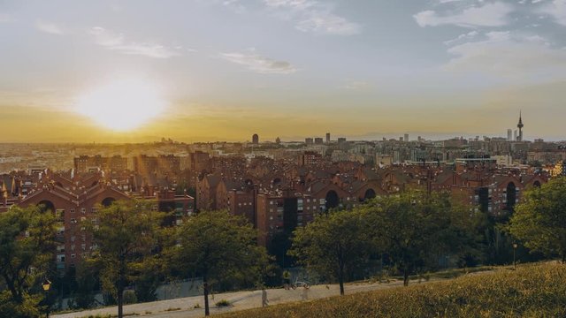 4K Timelapse Video clip of Panoramic aerial view of city of madrid at sunset. Skyline with old Town Cityscape and Metropolis Building. Capital of Spain with settting sun in backgorund.