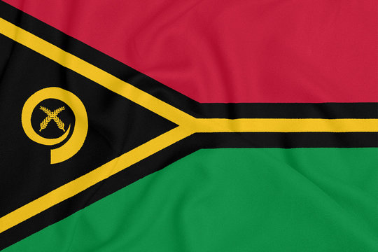 Flag Of Vanuatu On Smooth Silk Texture. National Symbol Of Vanuatu.