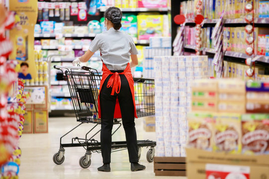 Supermarket Staff In Medical Protective Mask Working At Supermarket