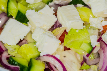 healthy food - salad with fresh vegetables and cheese