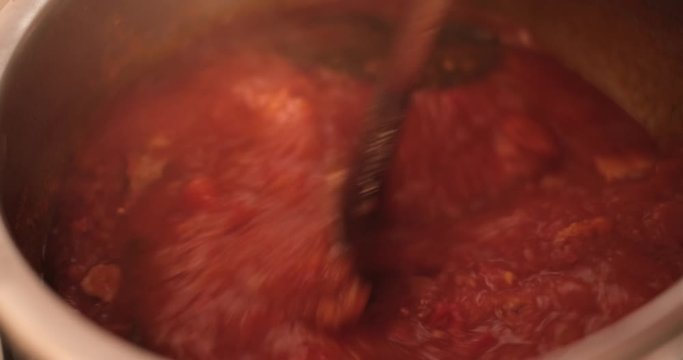 coocking tomato souce, italian traditional homemade dish. Concept of healthy mediterranean food.