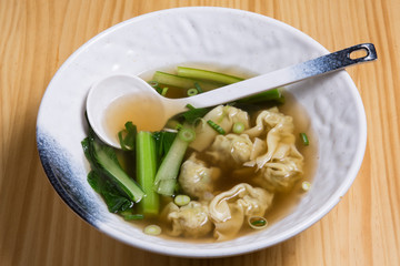 Prawn won ton dumplings noodle soup Cantonese style.