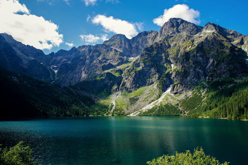 Naklejka na ściany i meble July 21, 2019. Mountain landscape with beautiful mirror lake and mountain range.