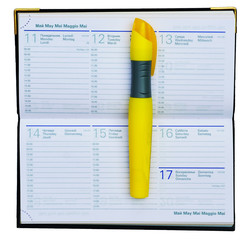 organizer and permanent yellow marker on yellow background, panoramic banner concept, copy space