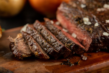 Sliced meat barbecue served with sea salt