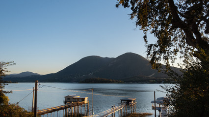 sunset on a lake with silhouette trees, Glenhaven, california