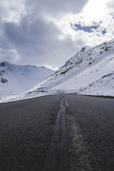 mountains just snowed with road