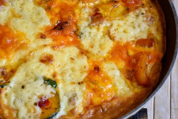 Close up of melted cheese in a pan 