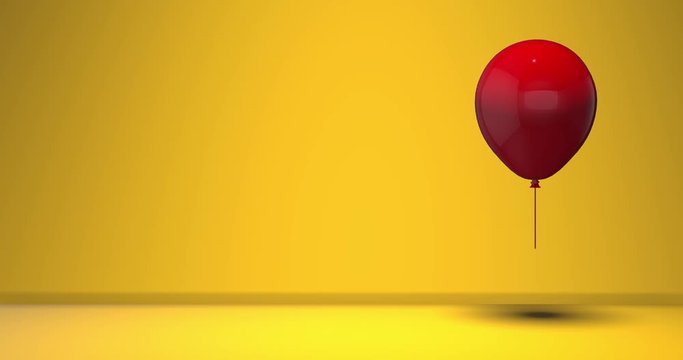 Abstract 3d model of glossy red ballon bouncing on yellow background. Celebration concept. Minimalist animation in 4k. Great for greeting card. With space for text