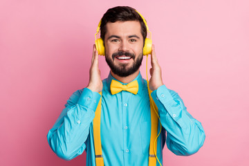 Fototapeta Close-up portrait of his he nice attractive cheerful cheery confident glad bearded guy meloman wearing mint shirt listening single hit pop sound isolated on pastel pink color background obraz
