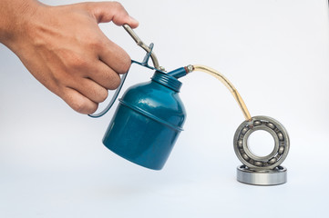 Oiler handle and ball bearings
isolated on a white background