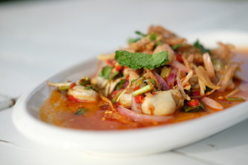Oysters spicy salad has many herbs