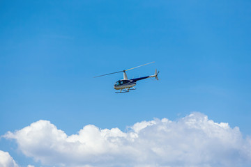 Fototapeta na wymiar passenger helicopter flies at an air show