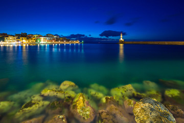 Obraz premium Lighthouse in the old Venetian port of Chania, Crete. Greece