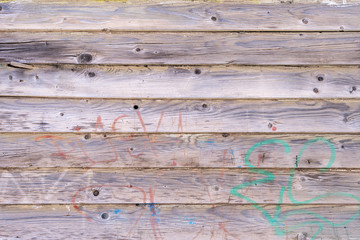 Eine Alte verwitterte braune Holzwand als ein Hintergrund
