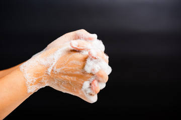 Fototapeta na wymiar woman washing hands with soap have foam