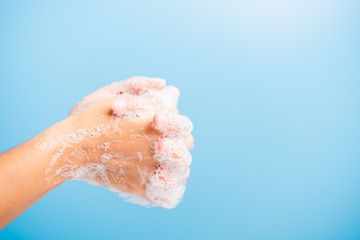 woman washing hands with soap have foam