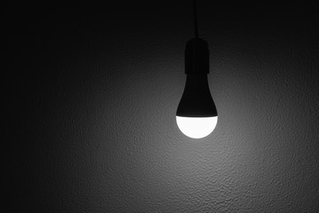 LED bulb with lighting with dark background