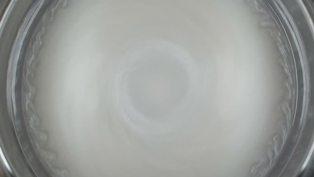 Rheoscopic fluid. Beautiful movement of particles in a liquid. Fantastic patterns and shapes. 50 fps