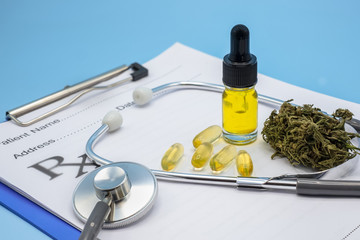 Hemp oil is put on the doctor's prescription stethoscope. Concepts of alternative medicine, herbal remedies Medical marijuana research