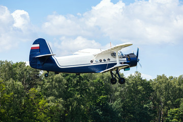 old transport plane flies at an air show