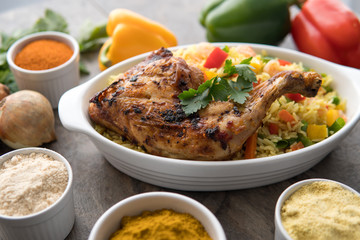 African fried food dish. Grilled chicken with plantain. Nigerian cuisine.
