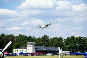 old transport plane flies at an air show