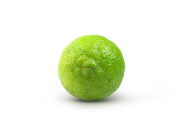 Fresh green lime isolated on white background with clipping path