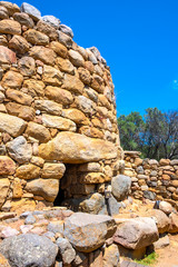 Arzachena, Sardinia, Italy - Archeological ruins of Nuragic complex La Prisgiona - Nuraghe La Prisgiona - with main entrance to stone tower of Neolithic fortress