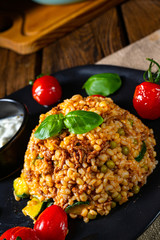 rustic bulgur fried with minced meat and vegetables