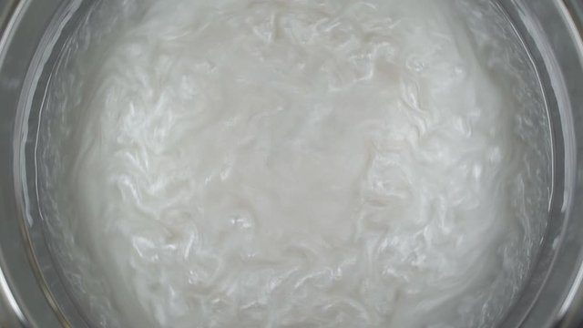 Rheoscopic fluid. Beautiful movement of particles in a liquid. Fantastic patterns and shapes. 50 fps