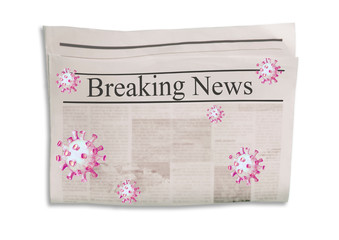 Coronavirus Covid-19 news. Newspaper with headline Breaking News on horizontal surface with flying virus