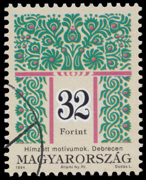 Stamp printed in Hungary shows Folk Art motives