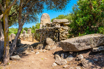 Arzachena, Sardinia, Italy - Archeological ruins of Nuragic necropolis Giants Tomb of Coddu Vecchiu  - Tomba di Giganti Coddu Vecchiu - with exterior of gallery grave of Neolithic cemetery